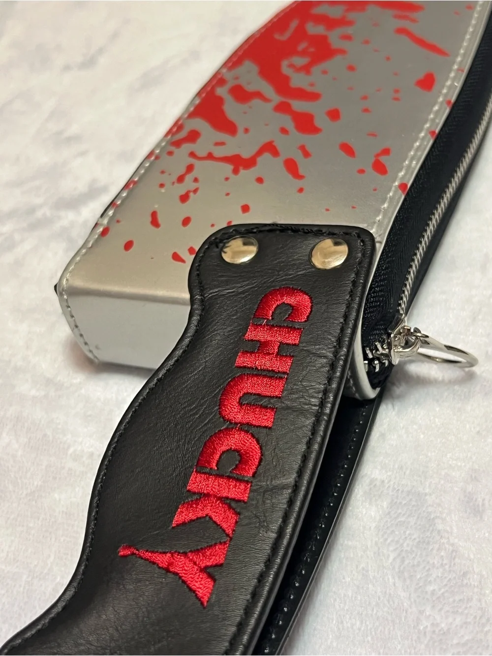 Spencer's Silver & Red Chucky Phone Case Pouch with Keyring Strap